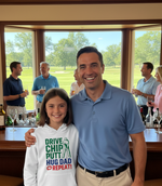 Man and young girl posing together in a golf club bar with a scenic background. The girl is wearing a Cows Corner hoodie with a funny golf slogan 'Drive Chip Putt Hug Dad Repeat!'. Cows Corner gifts are perfect for sport-mad fans, these gifts work brilliantly for birthdays, new baby celebrations, Father’s Day, Mother’s Day, Christmas, anniversaries, thank you gifts, end-of-season team awards, graduations, retirements, and just-because moments when you want to raise a smile. 
