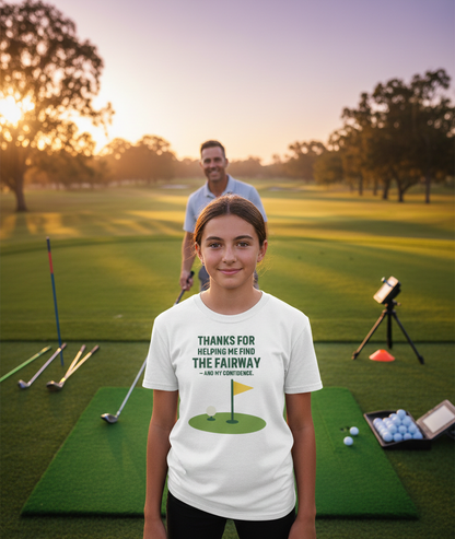 Person wearing a white t-shirt with a golf-themed message on a golf course. The girl is wearing a Cows Corner t-shirt with the funny golf slogan 'Thanks for Helping Me for the Fairway – and My Confidence'. Cows Corner gifts are perfect for sport-mad fans, these gifts work brilliantly for birthdays, new baby celebrations, Father’s Day, Mother’s Day, Christmas, anniversaries, thank you gifts, end-of-season team awards, graduations, retirements, and just-because moments when you want to raise a smile. 
