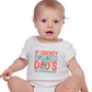 A baby wearing a baby grow with If Cricket Is Live, Then Dad’s the Groundskeeper on the front! Funny Cricket Baby Bodysuit, Organic or In-Conversion to Organic Cotton, Self Fabric Bound Neckline, Cuffs and Leg Openings