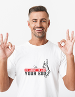 A man wearing a white t-shirt with a funny tennis slogan on the front that reads 'Shh....i'm About To Ace Your Ego'