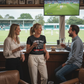 Three people in a sports bar watching a cricket match on television.  The lady is wearing a Cows Corner t-shirt with the funny cricket slogan on the front that says 'I Like My Balls Red And Hard'