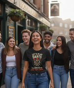 Group of friends standing together in front of a pub, with one person wearing a Cows Corner t-shirt with the funny darts slogan 'Lets Play Darts I'll Show You My Best Shaft Work'. Cows Corner gifts are perfect for sport-mad fans, these gifts work brilliantly for birthdays, new baby celebrations, Father’s Day, Mother’s Day, Christmas, anniversaries, thank you gifts, end-of-season team awards, graduations, retirements, and just-because moments when you want to raise a smile. 
