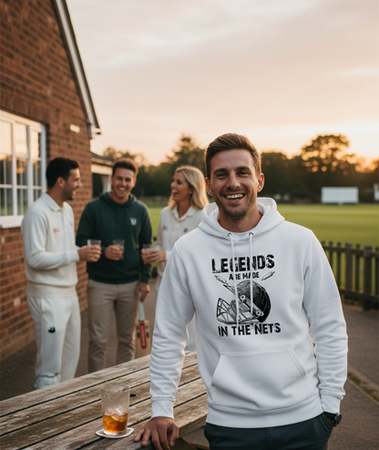 Man wearing a Cows Corner hoodie with 'Legends Are Made In The Nets' text, standing outdoors with friends. Cows Corner gifts are perfect for sport-mad fans, these gifts work brilliantly for birthdays, new baby celebrations, Father’s Day, Mother’s Day, Christmas, anniversaries, thank you gifts, end-of-season team awards, graduations, retirements, and just-because moments when you want to raise a smile. 

