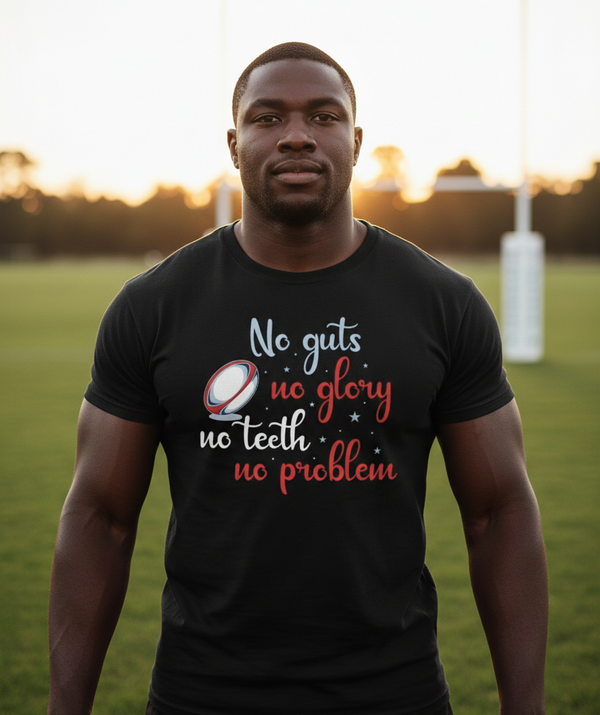 Man wearing a black t-shirt with a motivational quote on a sports field. The man is wearing a Cows Corner t-shirt with the funny rugby slogan 'No Guts No Glory No Teeth No Problem'. Cows Corner gifts are perfect for sport-mad fans, these gifts work brilliantly for birthdays, new baby celebrations, Father’s Day, Mother’s Day, Christmas, anniversaries, thank you gifts, end-of-season team awards, graduations, retirements, and just-because moments when you want to raise a smile. 
