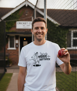 Man holding a red cricket ball in front of a cricket club building. The man is wearing a Cows Corner t-shirt with the funny cricket slogan 'I Bat in the Middle of a Hat-trick'.  Cows Corner gifts are perfect for sport-mad fans, these gifts work brilliantly for birthdays, new baby celebrations, Father’s Day, Mother’s Day, Christmas, anniversaries, thank you gifts, end-of-season team awards, graduations, retirements, and just-because moments when you want to raise a smile. 
