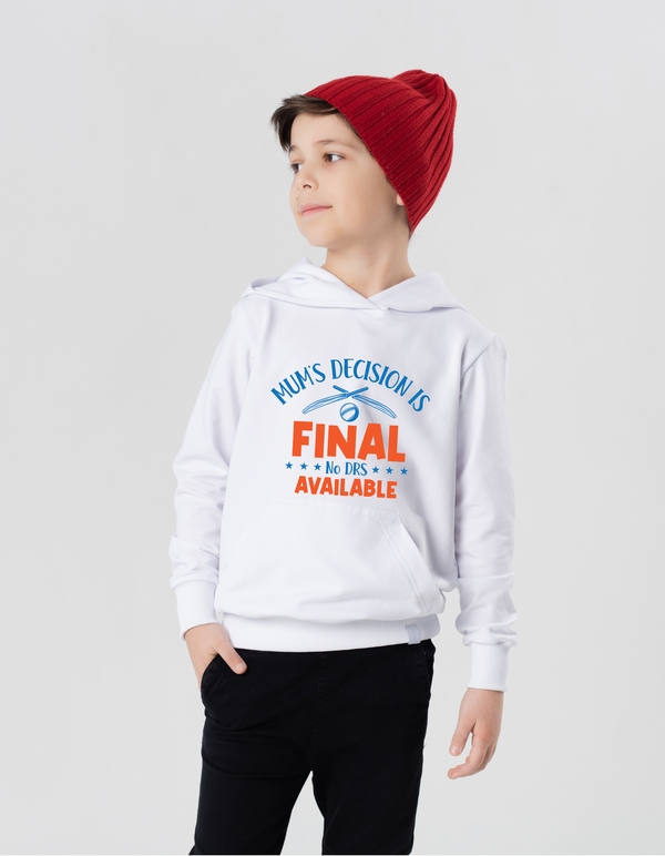 A little boy wearing a white hoodie with Mums Decisions is Final No DRS Available on the front.  A Funny Cricket Hoodie, Premium Fabric, Multiple Junior Sizes, Perfect for Boys and Girls