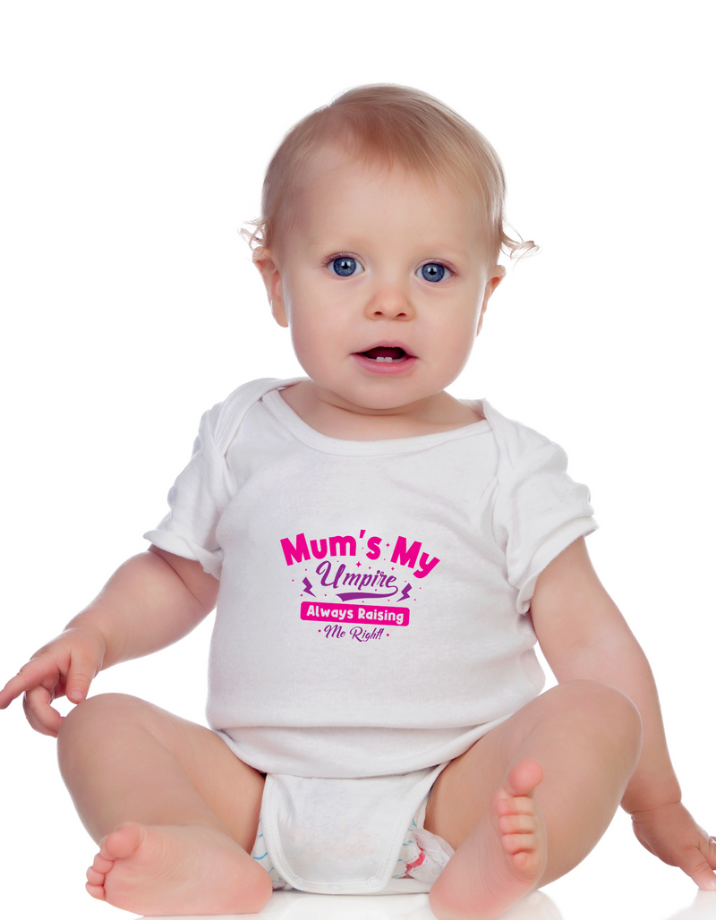 A baby wearing a baby grow with Mums My Umpire Always Raising Me Right! Funny Cricket Baby Bodysuit, Organic or In-Conversion to Organic Cotton, Self Fabric Bound Neckline, Cuffs and Leg Openings