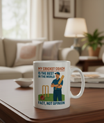 Mug with cricket-themed design on a table in a living room setting. This is a Cows Corner mug with a funny cricket slogan 'My Cricket Coach Is the Best in the World Fact, Not Opinion'. Cows Corner gifts are perfect for sport-mad fans, these gifts work brilliantly for birthdays, new baby celebrations, Father’s Day, Mother’s Day, Christmas, anniversaries, thank you gifts, end-of-season team awards, graduations, retirements, and just-because moments when you want to raise a smile. 
