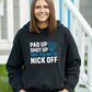 A lady wearing a black hoodie with Pad Up, Shut Up and Try Not to Nick Off on the front! A Funny Cricket Hoodie, Premium Fabric, Multiple Adult Sizes