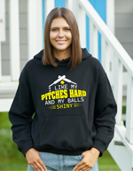 A lady wearing a black hoodie with I Like My Pitches Hard and My Balls Shiny on the front! A Funny Cricket Hoodie, Premium Fabric, Multiple Adult Sizes
