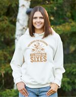 A lady wearing a white hoodie with You Bring the Sledging, I'll Bring the Sixes on the front. A Funny Cricket Hoodie, Premium Fabric, Multiple Adult Sizes