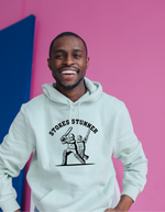 A man wearing a white hoodie with Stokes Stunner, on the front. A Funny Cricket Hoodie, Premium Fabric, Multiple Adult Sizes