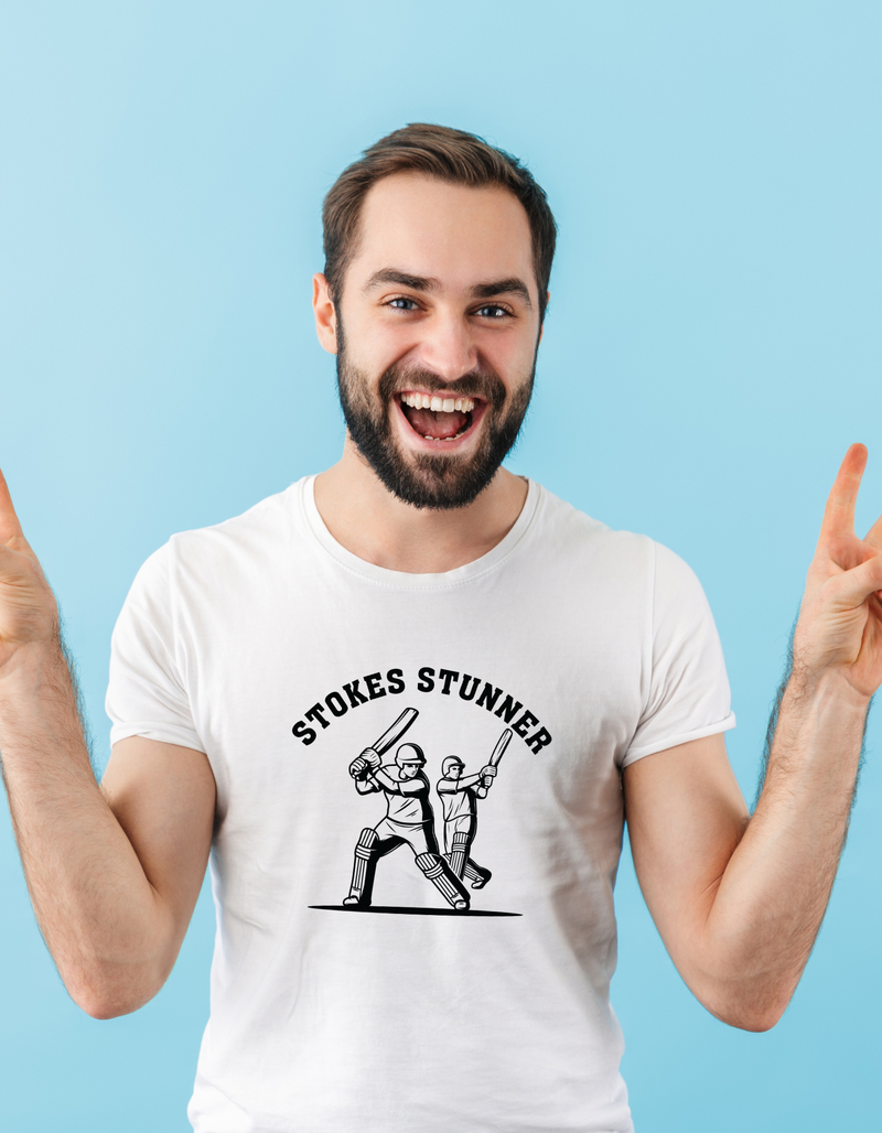 A man wearing a white t-shirt with Stokes Stunner Cricket on the front. A Funny Cricket T-Shirt, Premium Fabric, Multiple Adult Sizes