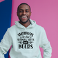 A man wearing a white hoodie with Sundays Are for Sledges Sixes and Beers, on the front.  Funny Cricket Hoodie, Premium Fabric, Multiple Adult Sizes