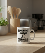 White mug with humorous text on a kitchen counter. This is a Cows Corner mug with a funny golf slogan 'When I Die Bury Me on the Golf Course So My Husband Will Visit'. Cows Corner gifts are perfect for sport-mad fans, these gifts work brilliantly for birthdays, new baby celebrations, Father’s Day, Mother’s Day, Christmas, anniversaries, thank you gifts, end-of-season team awards, graduations, retirements, and just-because moments when you want to raise a smile. 

