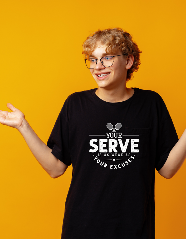 A man wearing a black t-shirt with the funny tennis slogan on the front that reads 'Your Serve Is As Weak As Your Excuses'