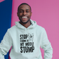 A man wearing a white hoodie with Stop Looking at My Middle Stump on the front. A Funny Cricket Hoodie, Premium Fabric, Multiple Adult Sizes