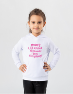 A little girl wearing a white hoodie with Mums Like a Good All-Rounder on the front. A Funny Cricket Hoodie, Premium Fabric, Multiple Junior Sizes, Perfect for Boys and Girls