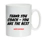 White mug with black text 'Thank you coach - you are the best' and red text 'Happy Birthday' on a white background