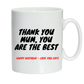 A white Cows Corner mug with black text 'Thank you Mum, you are the best' and red text 'Happy Birthday - Love you lots' on a white background.