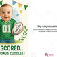 Baby in green sports jersey holding a rugby ball with celebratory text and graphics. This is a beautiful Cows Corner Card